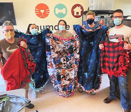 Foremost staff volunteering at local business